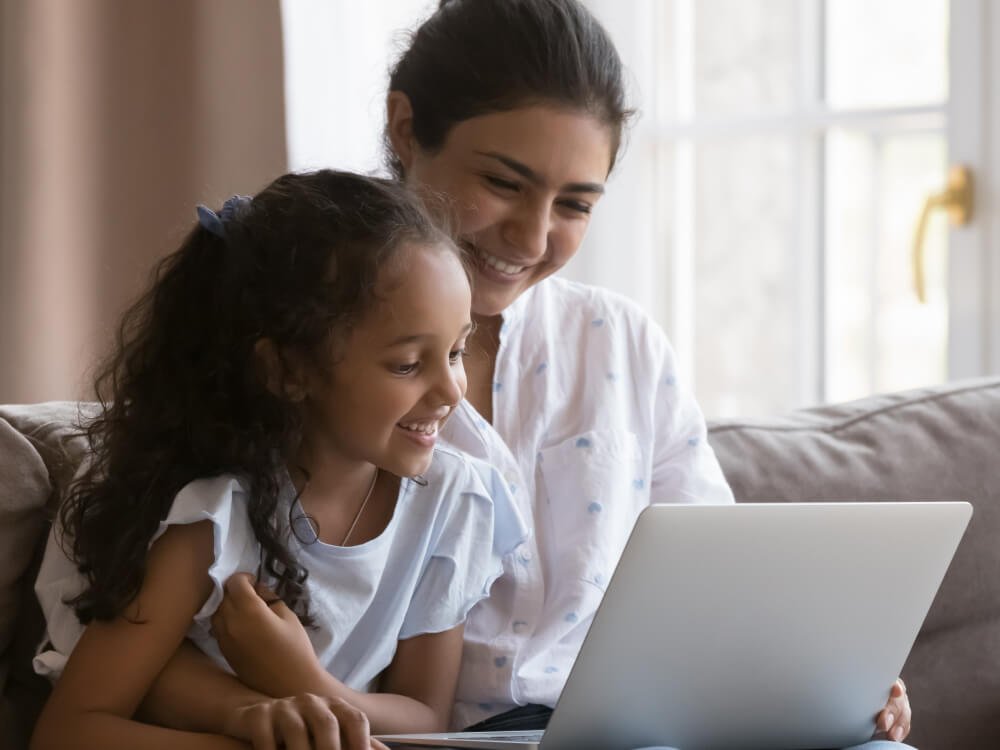 Mom and daughter studying together