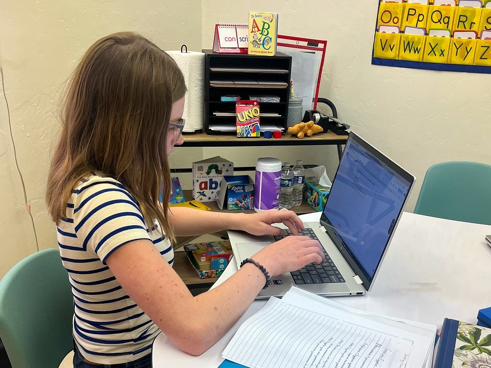 8th Grader in writing tutoring class