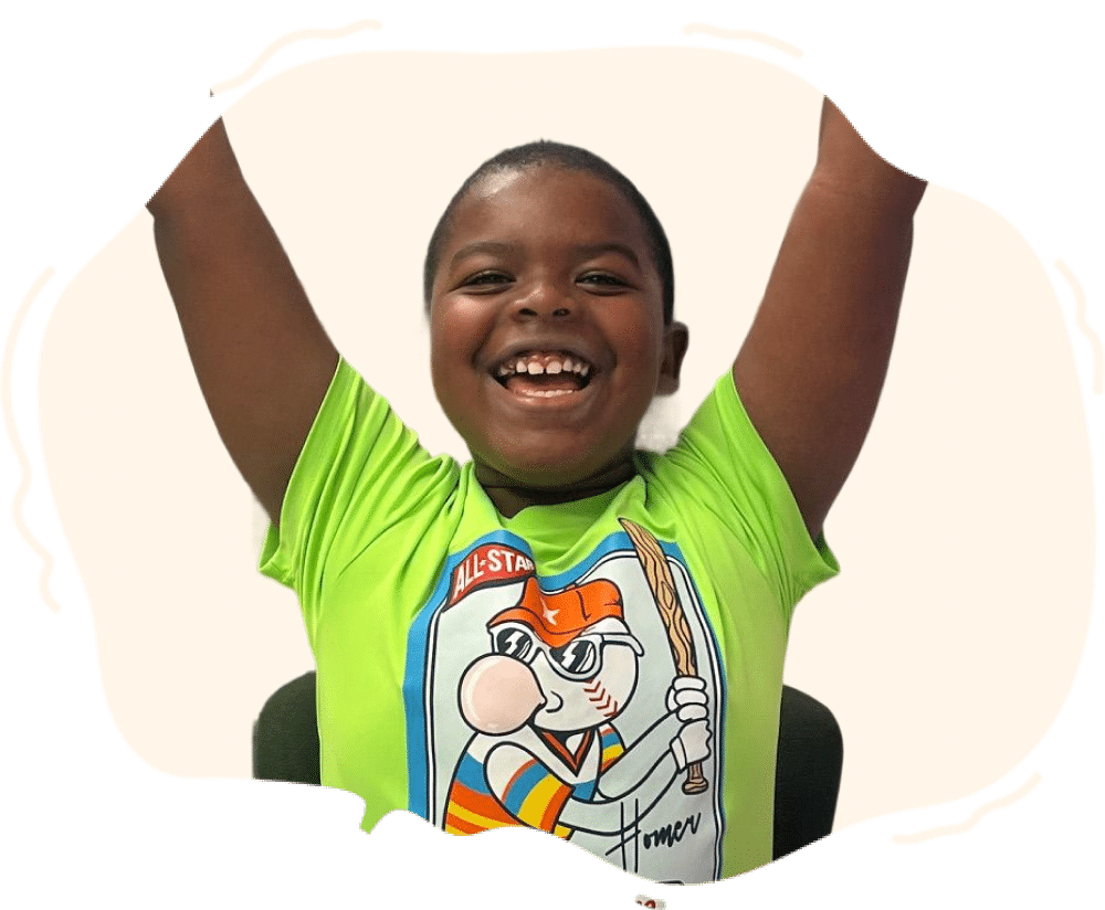 Happy student with arms raised